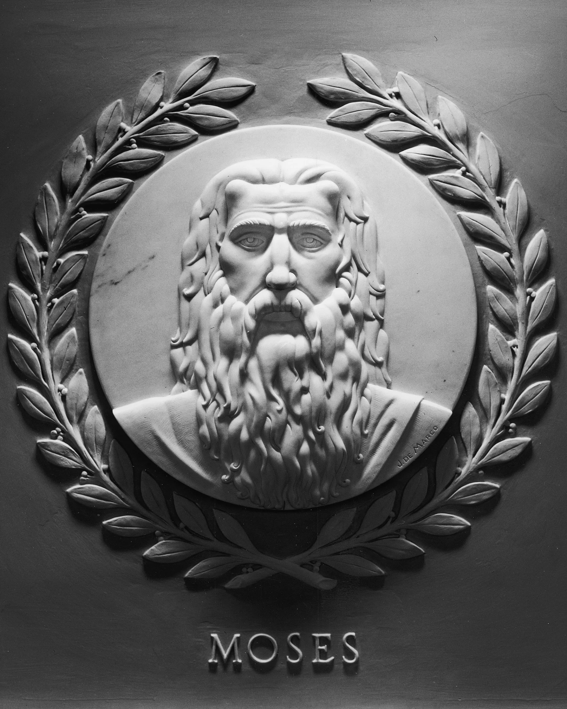 Marble relief portrait of Moses over the gallery doors of the U.S. House Chamber
